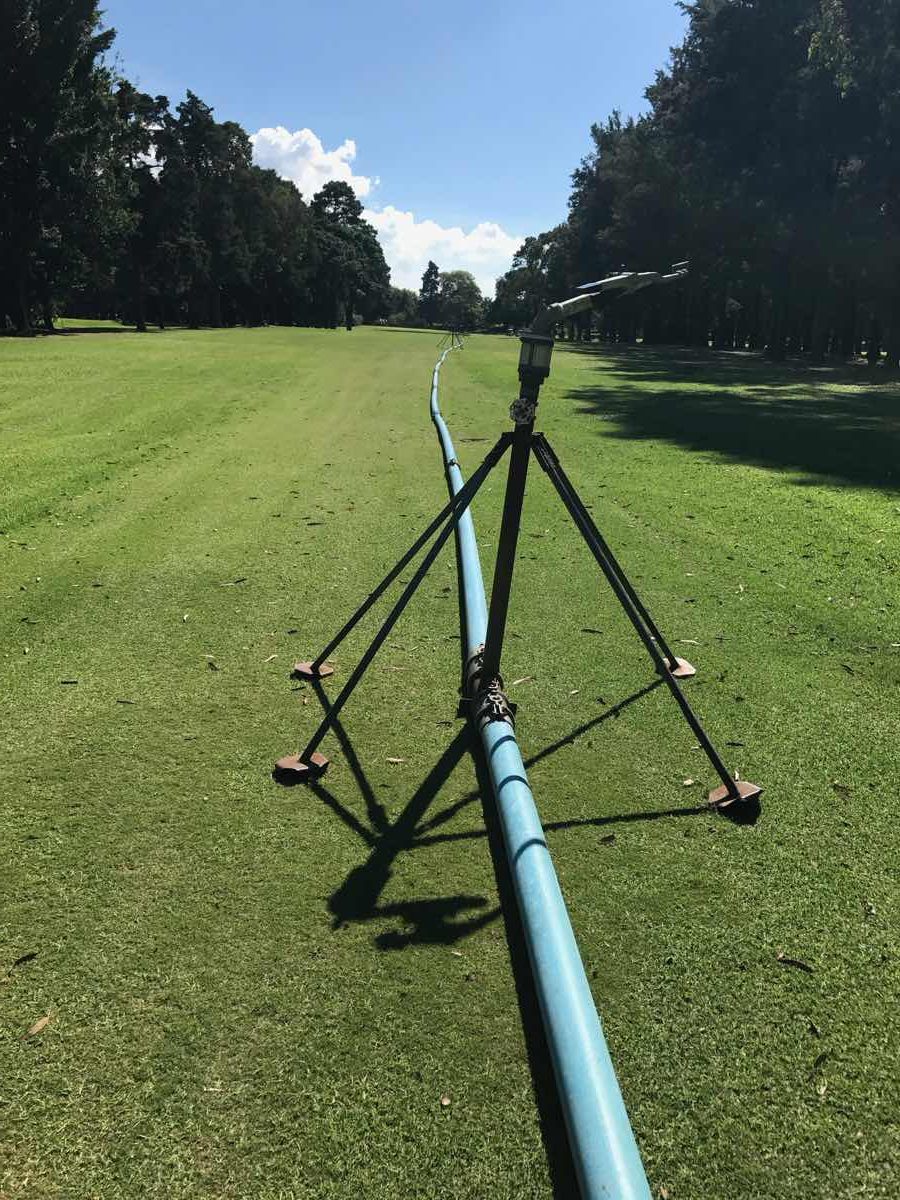 Grow-in sprinkler running on lay-flat pipe
